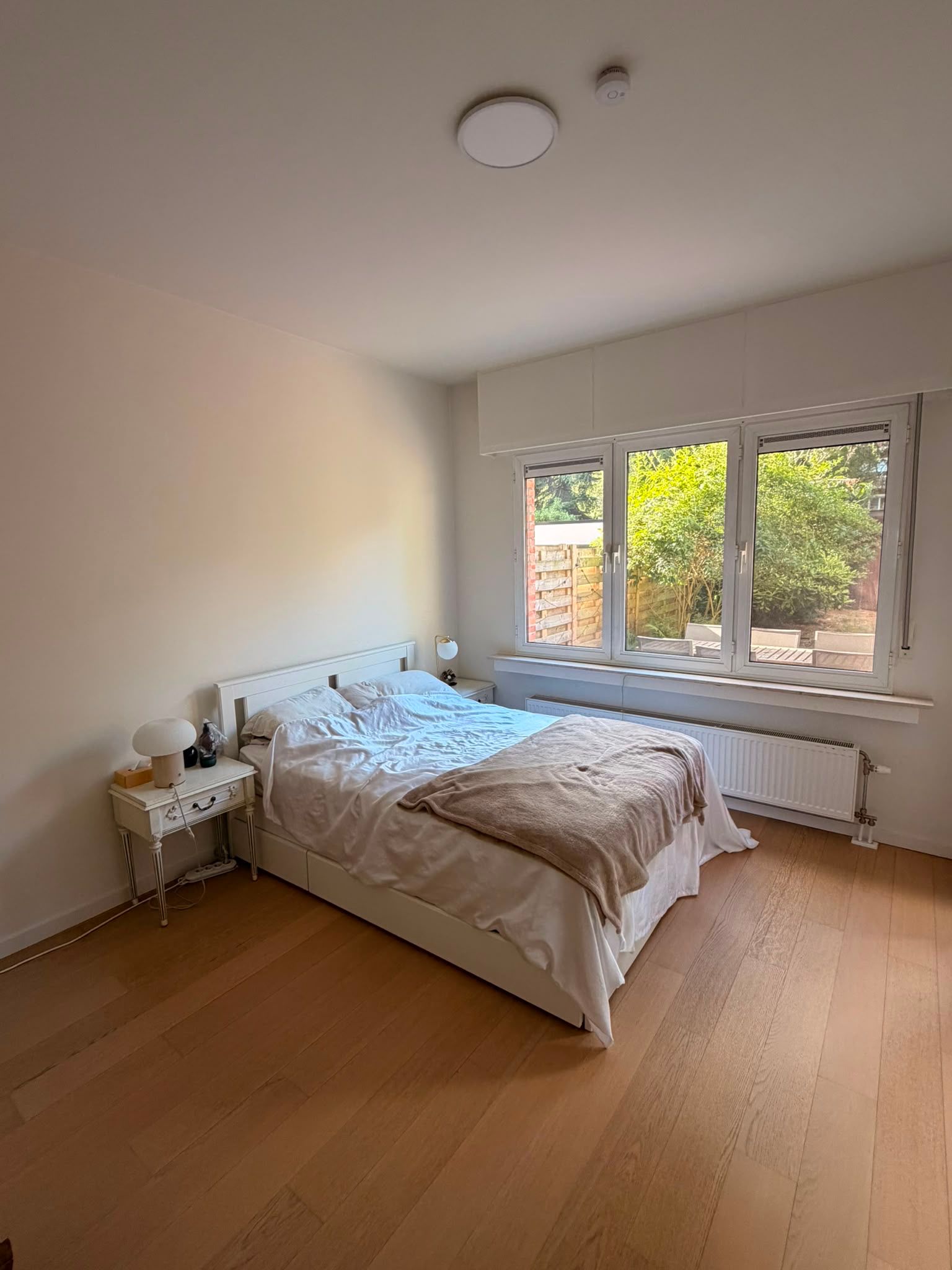 Gelijkvloers 2 slaapkamers appartement met tuin van 110 m², gerenoveerd in 2020 - foto 2