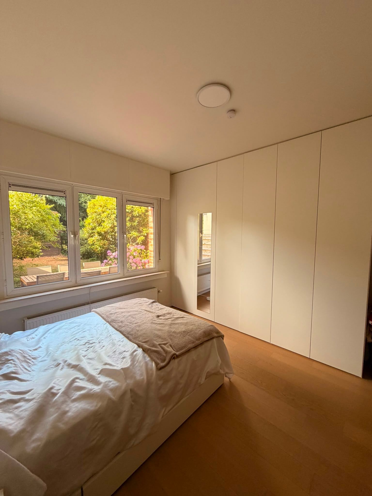 Gelijkvloers 2 slaapkamers appartement met tuin van 110 m², gerenoveerd in 2020 - foto 7