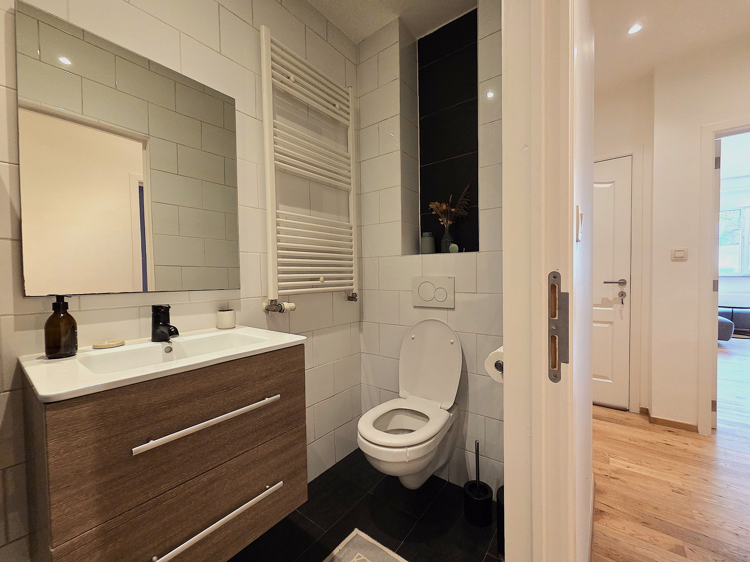 Instapklaar appartement met 2 slaapkamers en gezellige tuin - foto 4