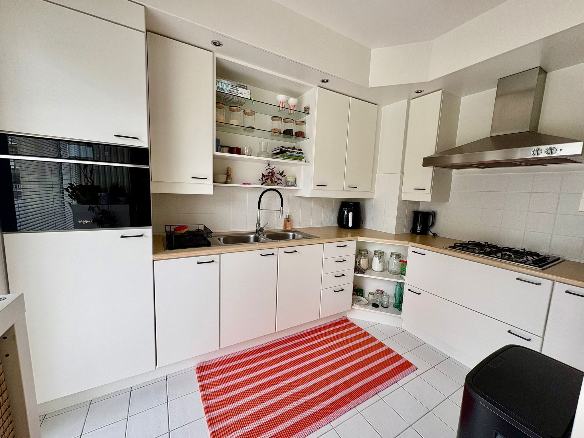 Instapklaar gelijkvloers appartement met gemeenschappelijke tuin - foto 2