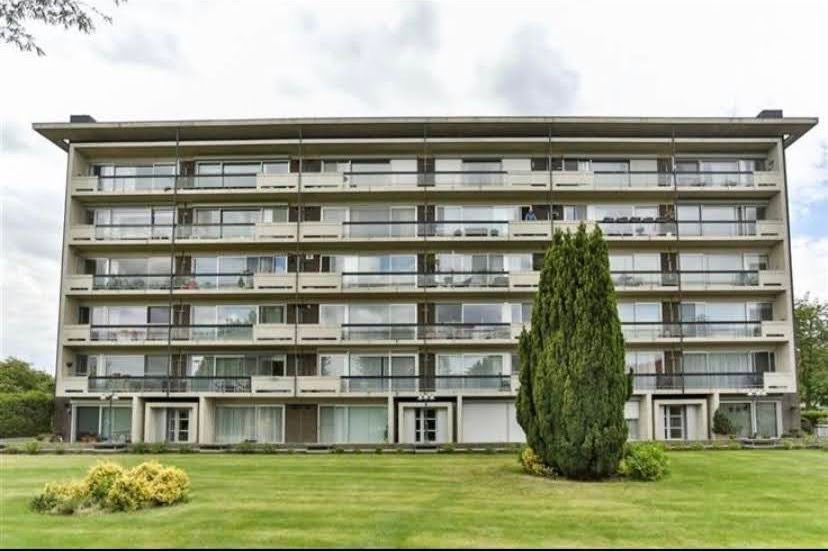 Instapklaar gelijkvloers appartement met gemeenschappelijke tuin - foto 9
