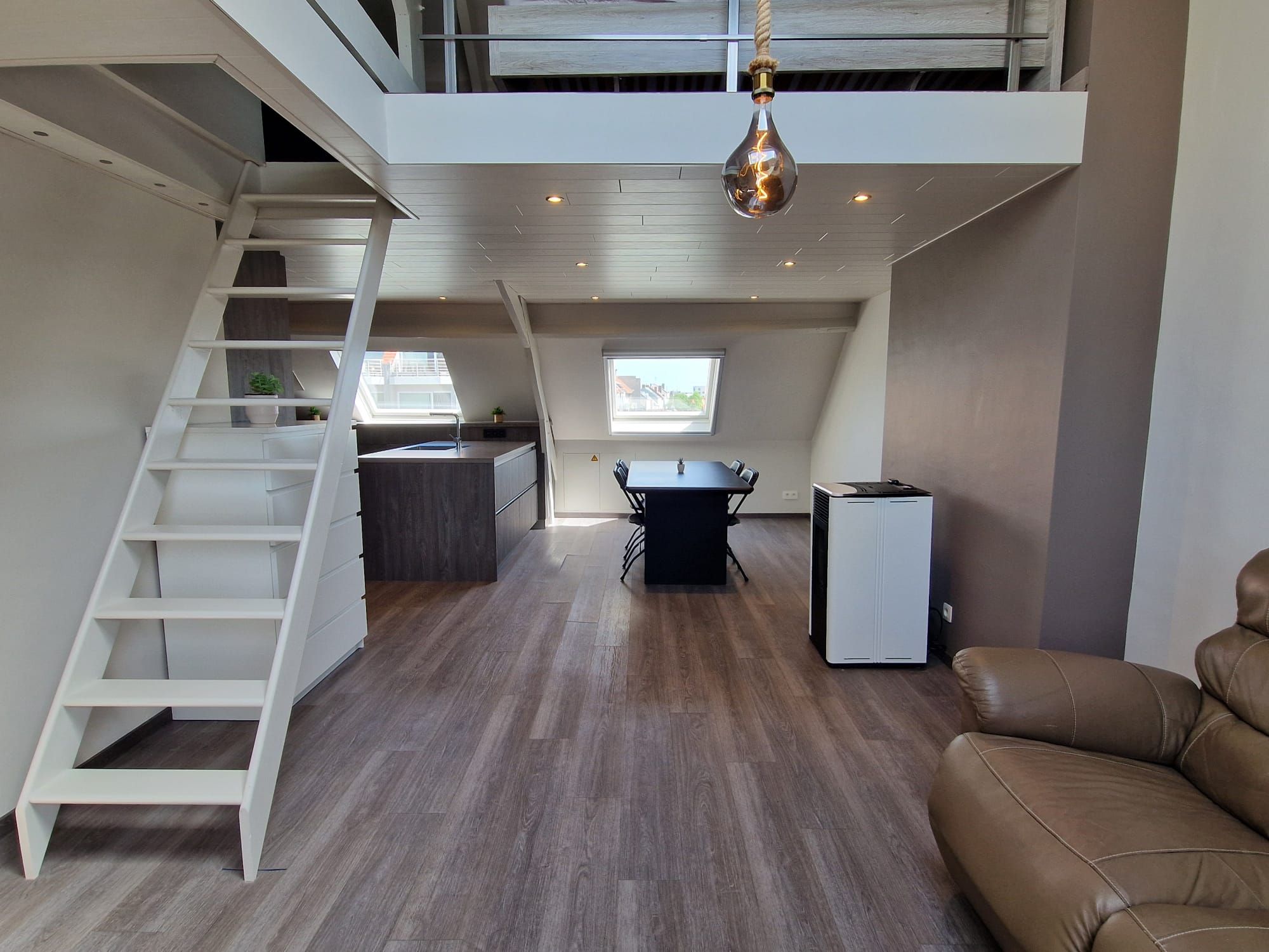 Unieke en lichtrijke dakappartement met mezzanine - foto 4