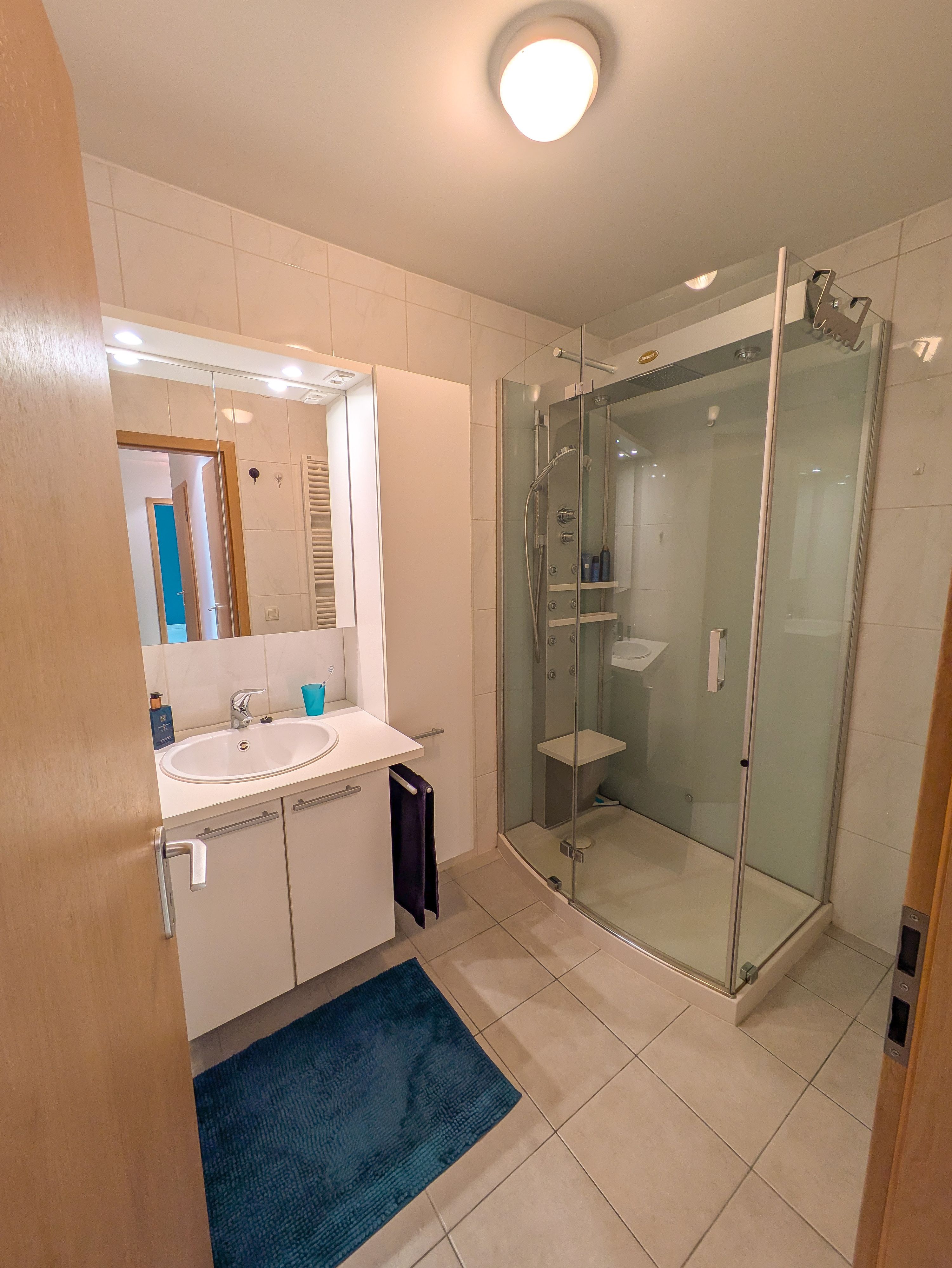 Instapklaar appartement met 2 slaapkamers en inpandige staanplaats in Merelbeke. - foto 8