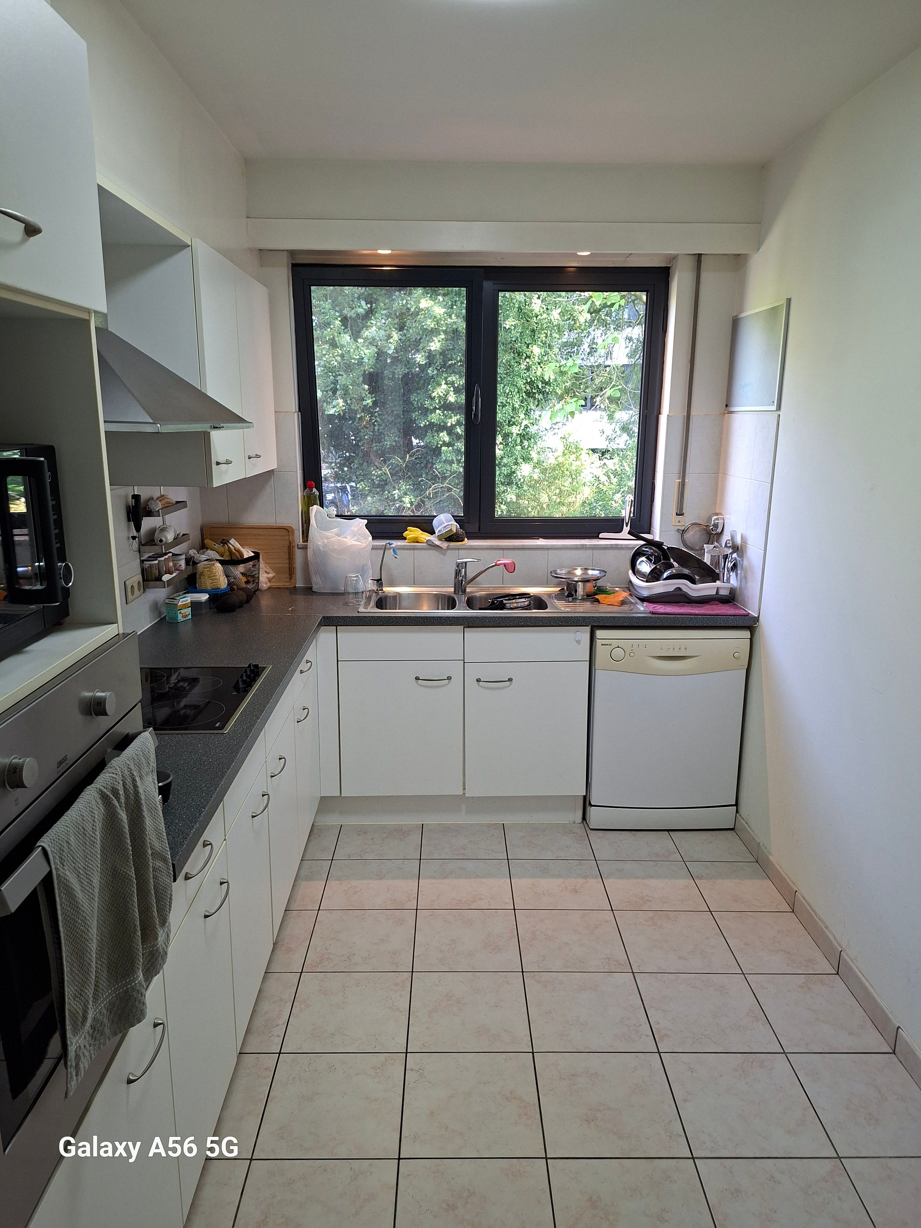 Ruim confortabel appartement met privé binnenhuis parking en  zonnige tuin - foto 11