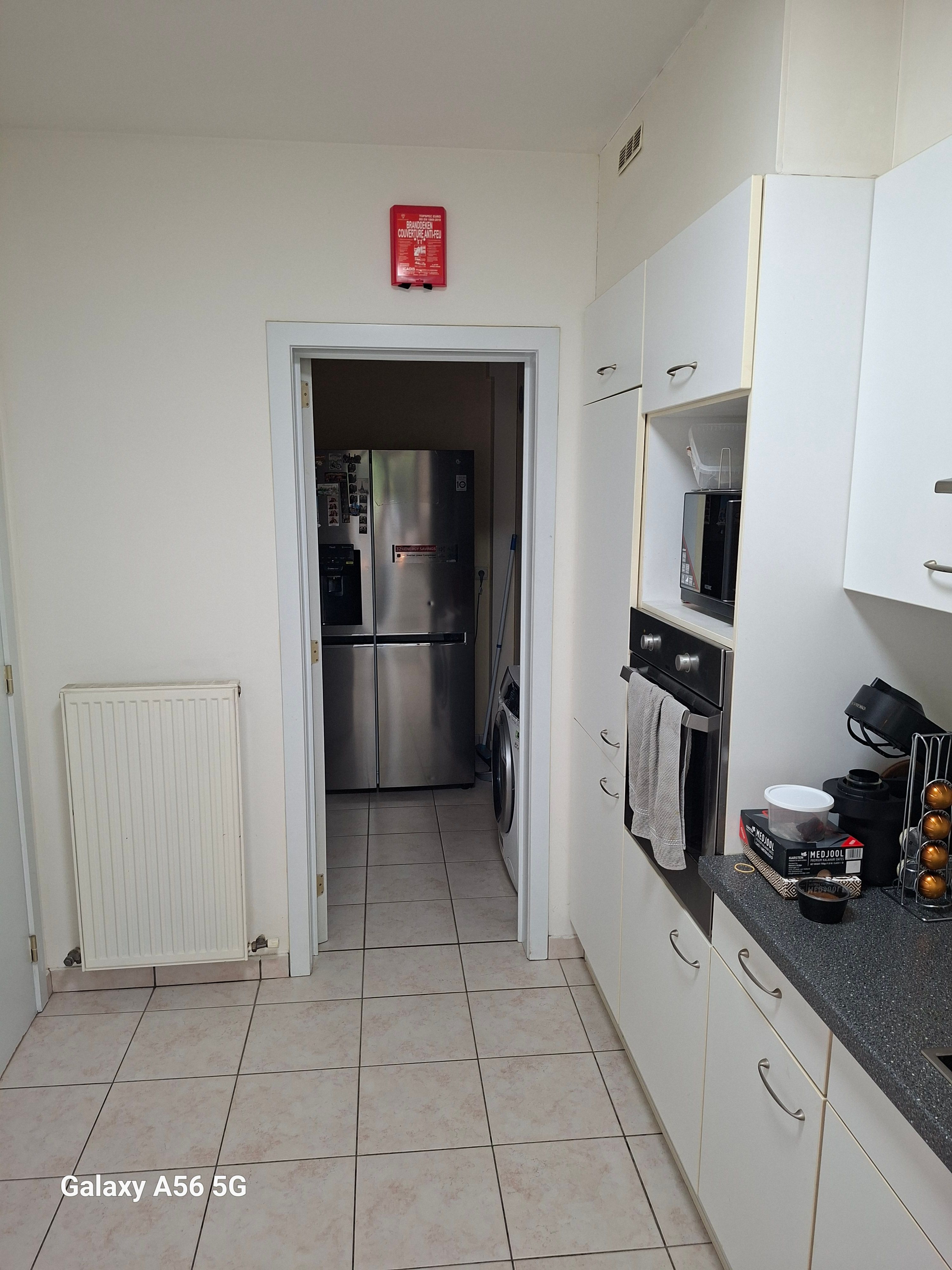 Ruim confortabel appartement met privé binnenhuis parking en  zonnige tuin - foto 13