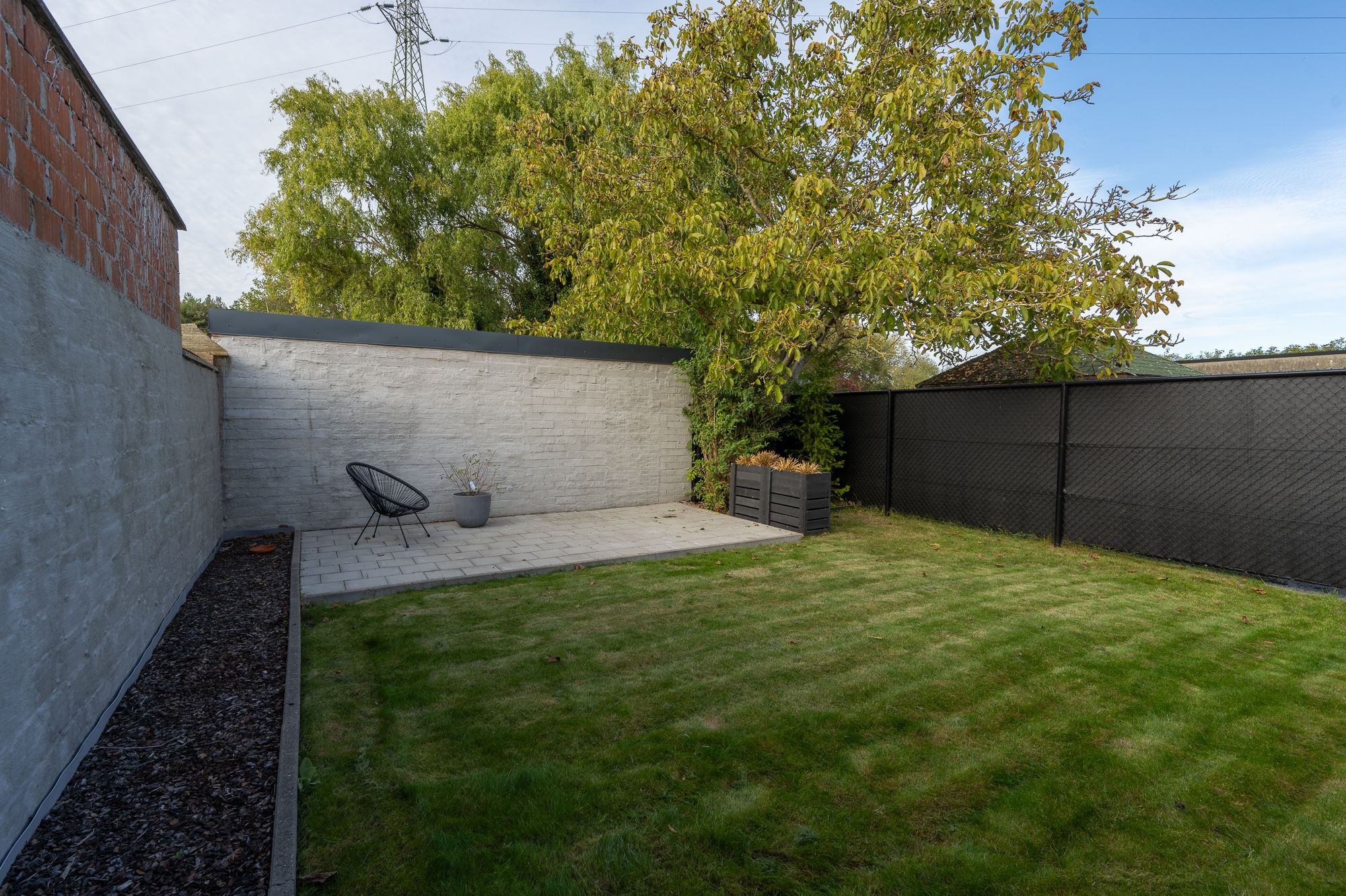 Gerenoveerde woning met 2 slpk, 2 garages & zonnepanelen - foto 8