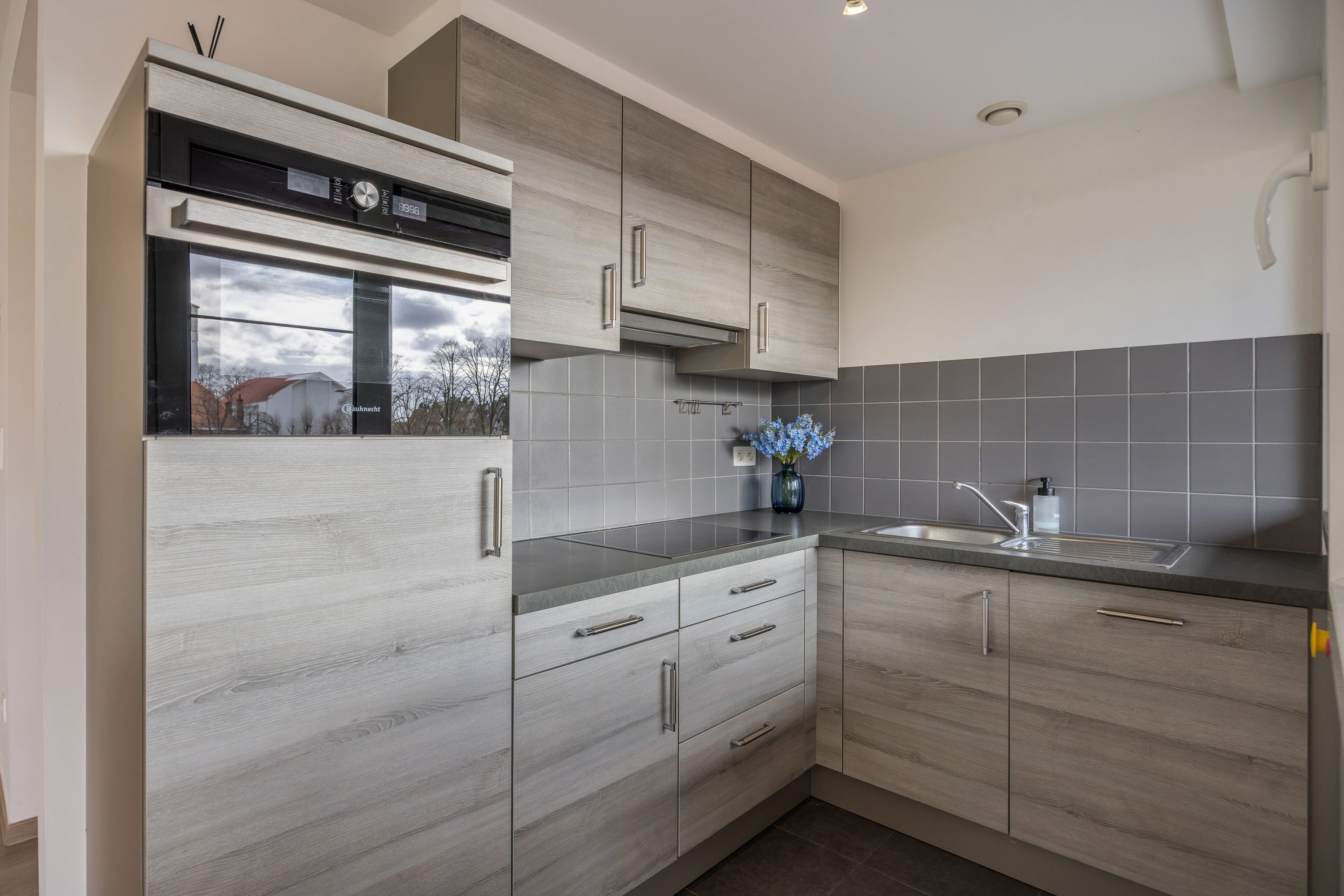 Lichtrijk hoekapp. met ondergrondse parking in Boekt - foto 5