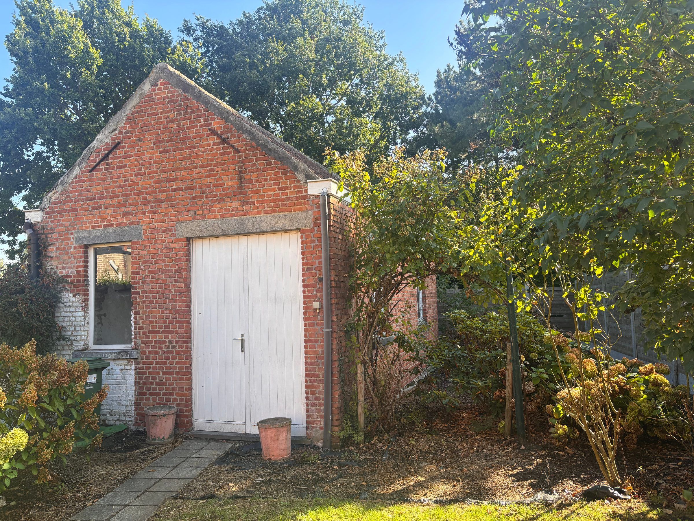 Ruime renovatiewoning met tuin, garage en bijgebouw - foto 19