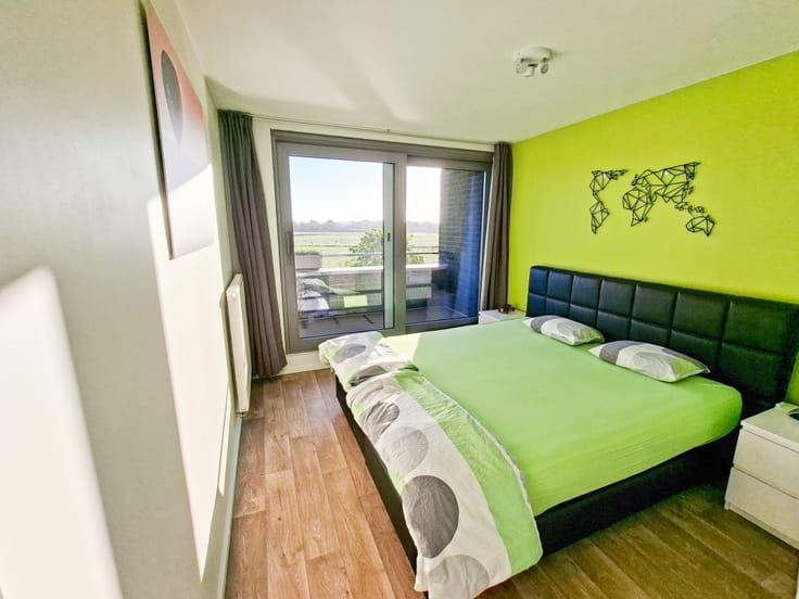 Modern, lichtrijk 2-slaapkamerappartement incl. garage en zicht op groen - foto 5