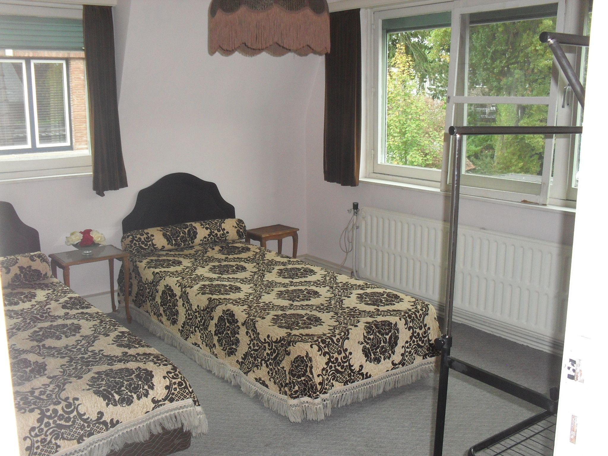 Te renoveren fifties landhuis met grote parktuin, dubbele garage en magazijn - foto 24