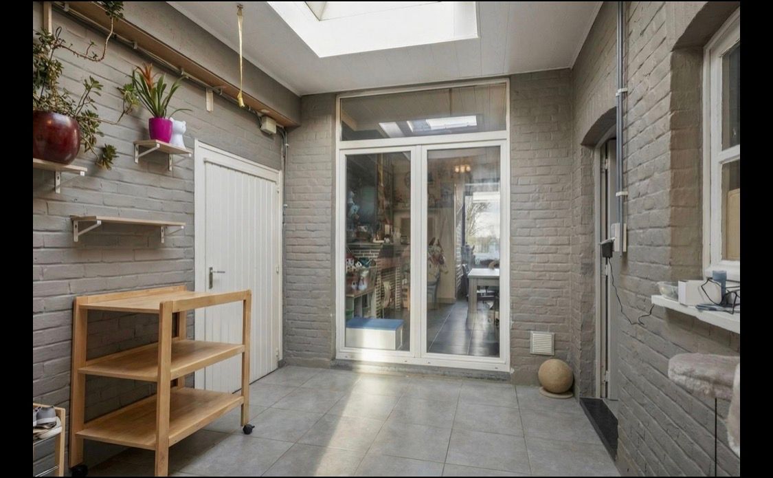 Rijwoning met grote tuin - foto 6