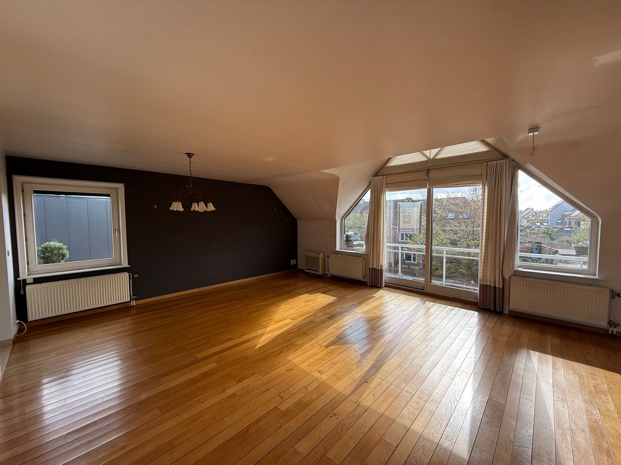 Ruim appartement met garage en grote gemeenschappelijke tuin - foto 2