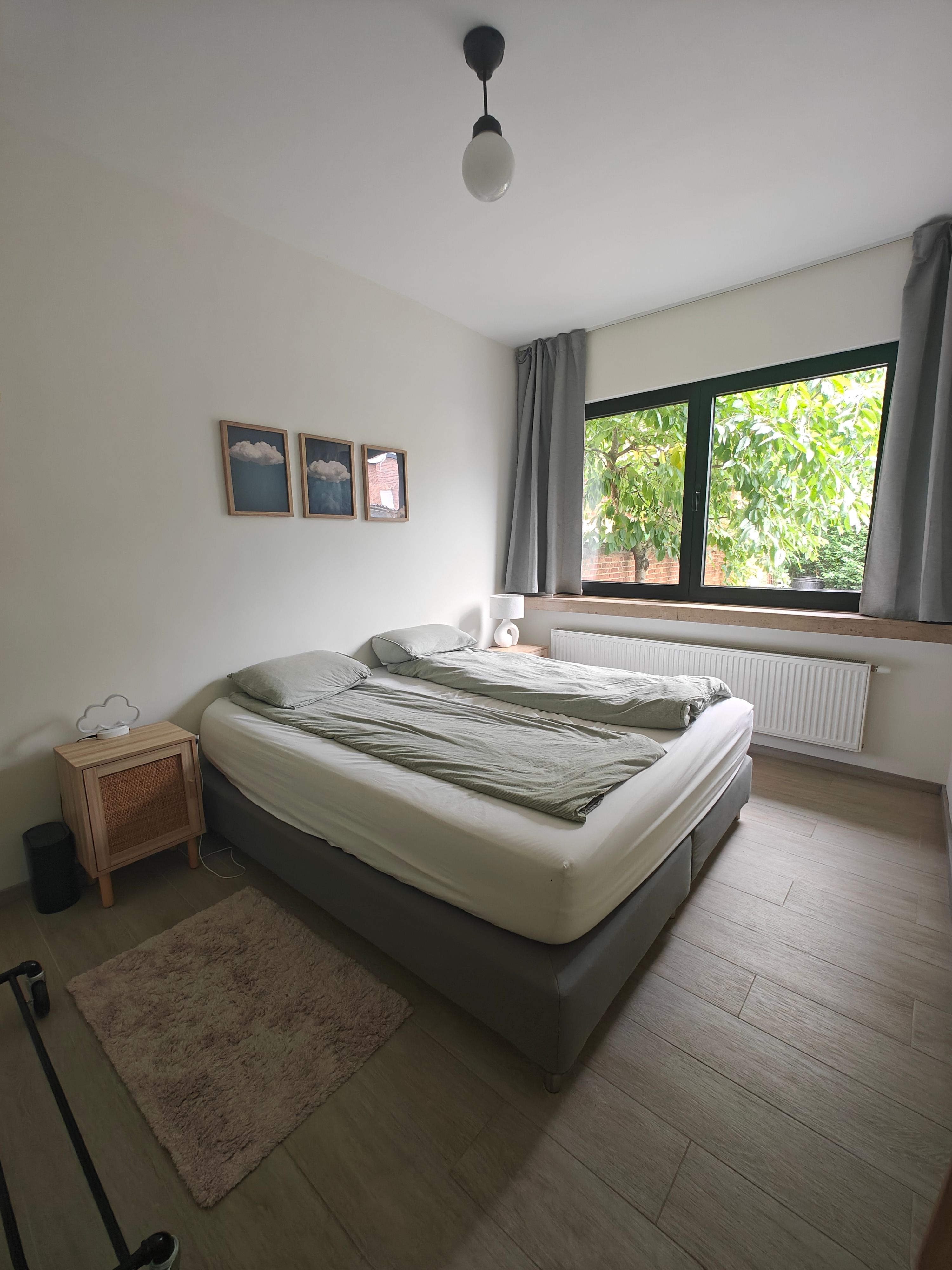 Charmant éénslaapkamerappartement met tuin - foto 7