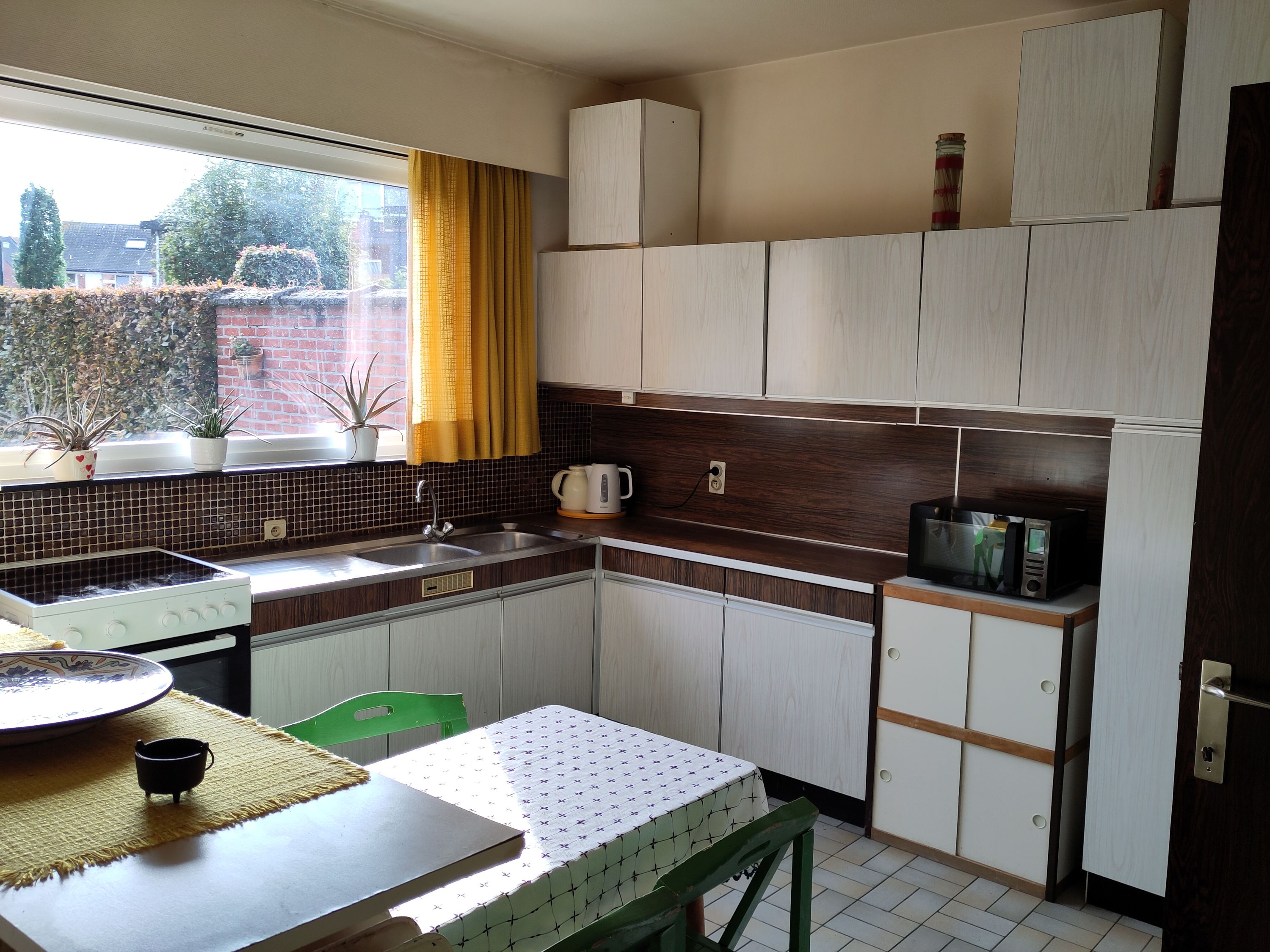 Halfopen bebouwing  met 4 slaapkamers en tuin in centrum Beveren - foto 4