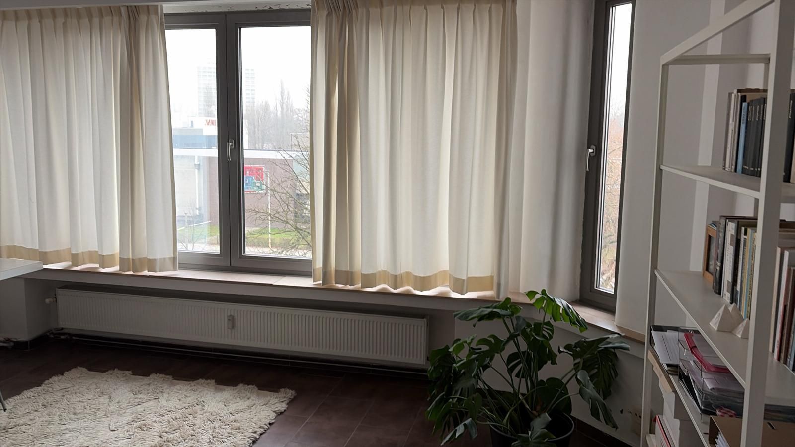 Lichtrijk appartement met 2 slaapkamers in een goede buurt - foto 8