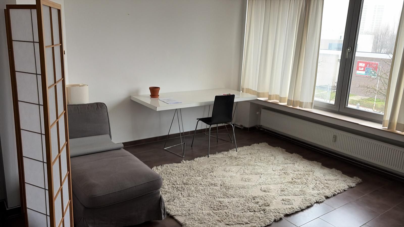 Lichtrijk appartement met 2 slaapkamers in een goede buurt - foto 7