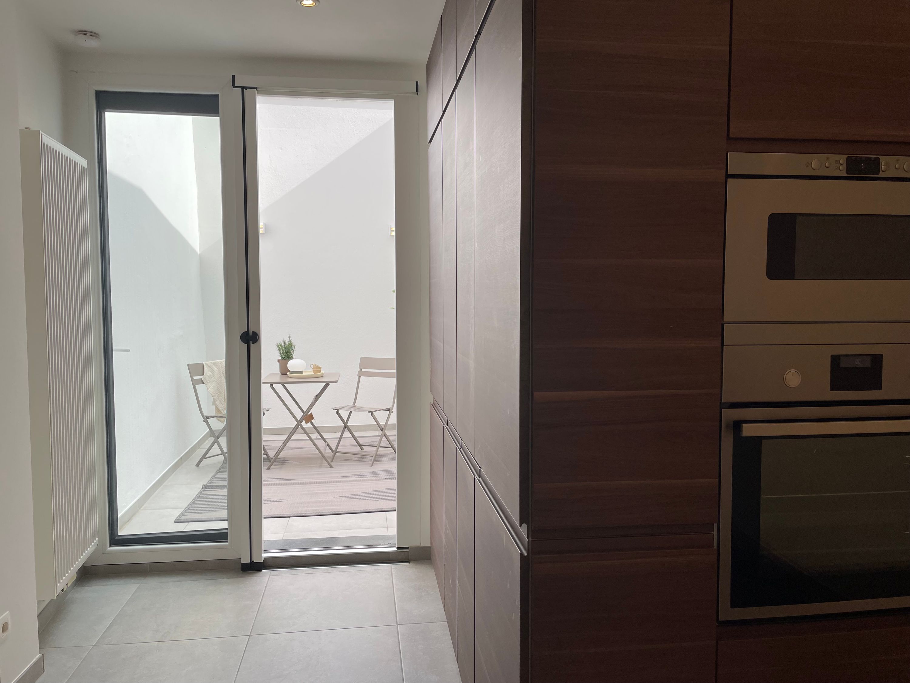 Instapkaart gerenoveerde woning met oostgericht terras nabij station Tienen - foto 10